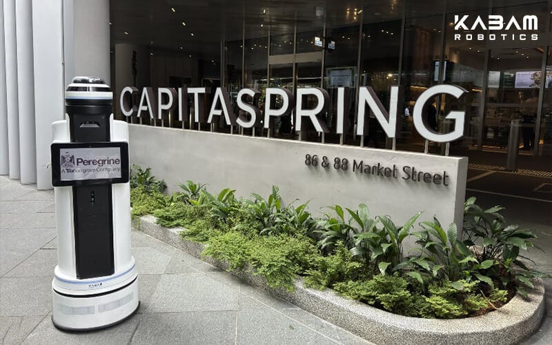 KABAM security robot stationed outside CapitaSpring at Market Street, Singapore
