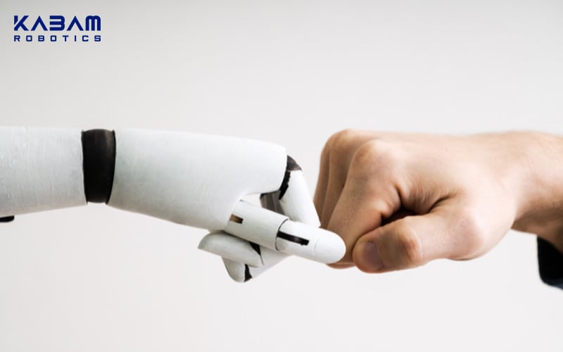Robot and human fist bumping